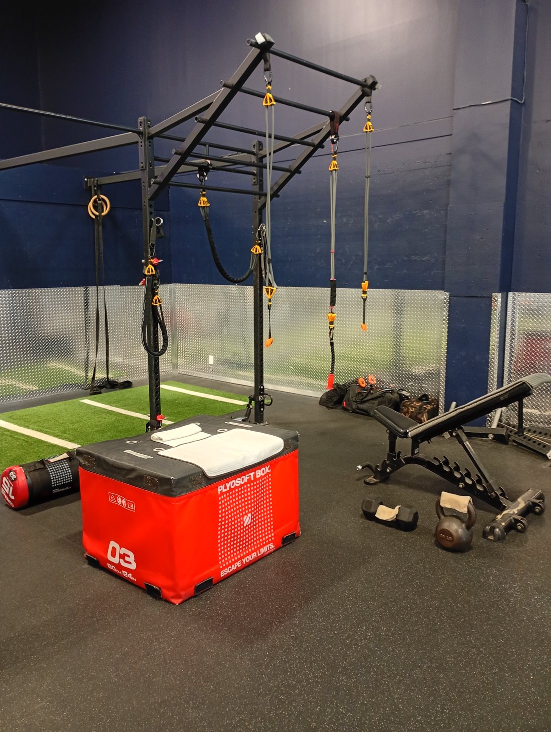 Full kinetic rig with plyo box and kettlebells