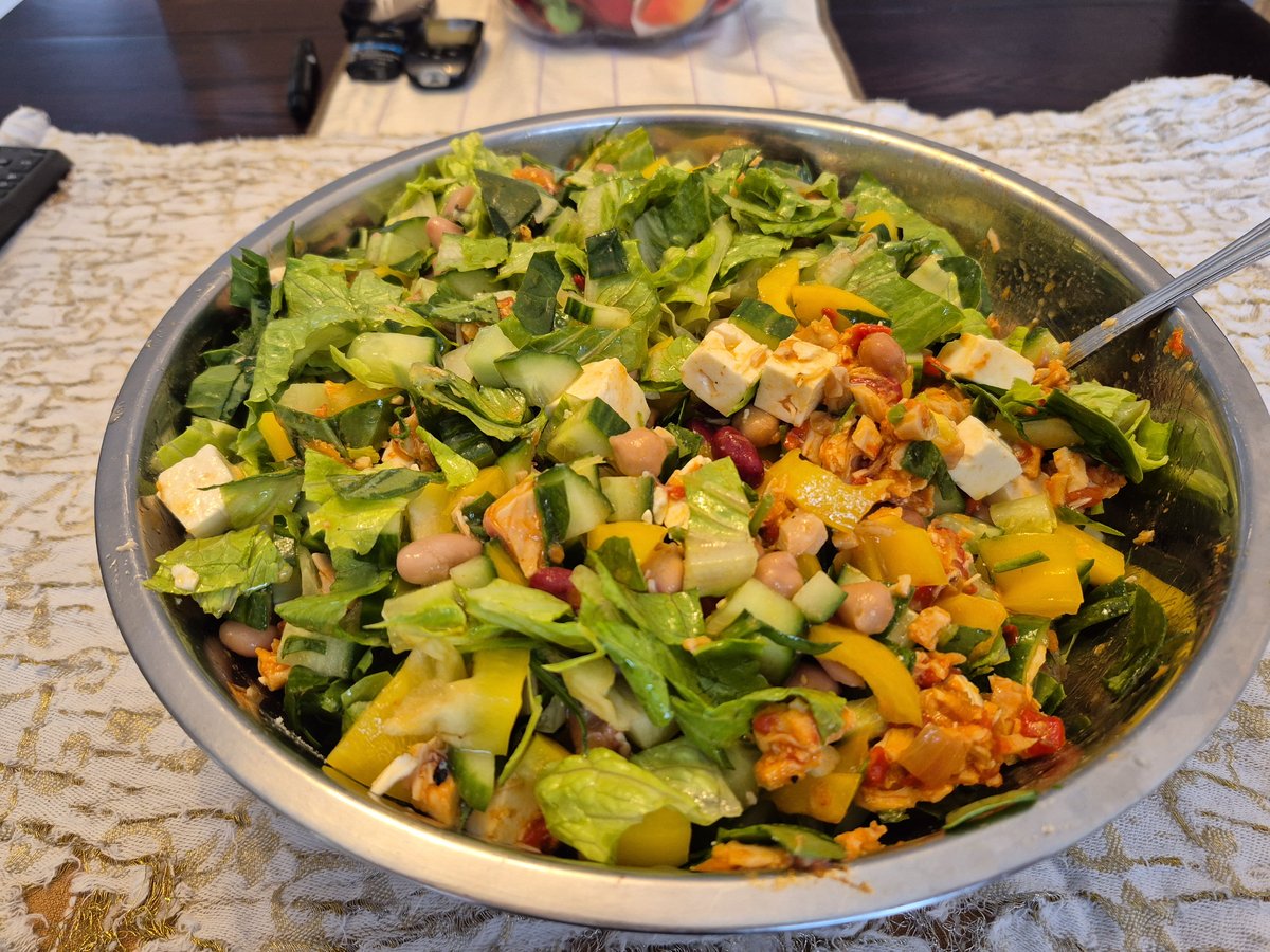 Mega salad with mango, chickpeas, kale and feta